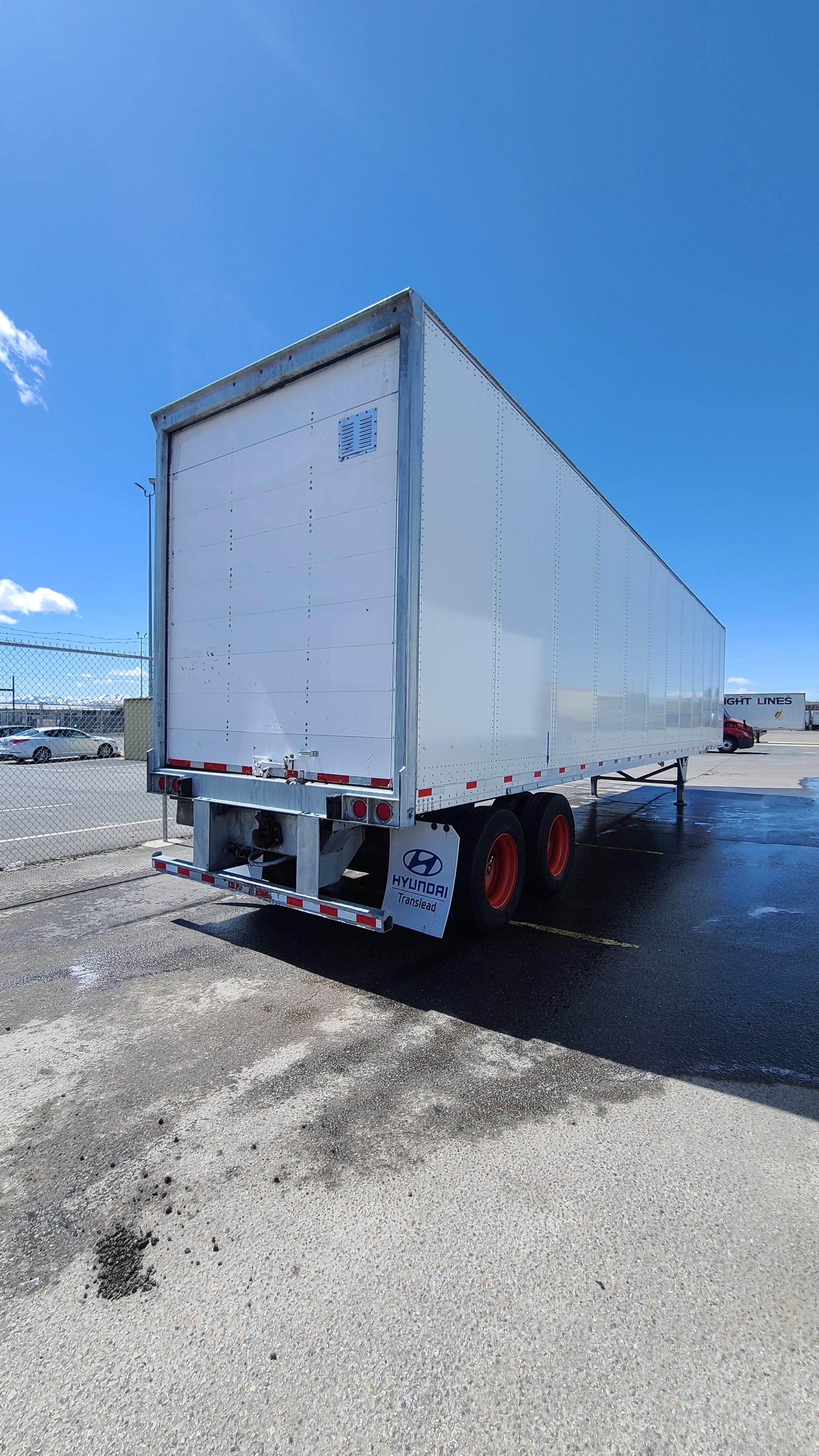 Hyundai Translead commercial trailer after professional decal removal and fleet washing — spotless white side panel and rear doors, Power Stream USA Utah