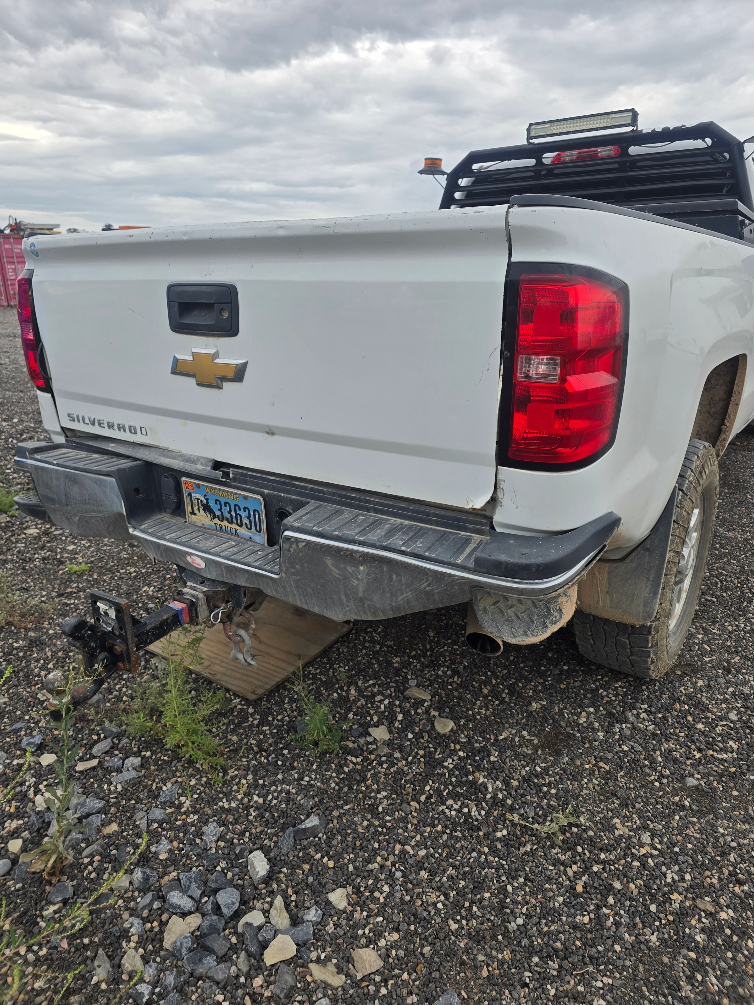 Titan Chevrolet Silverado pickup PU-53 before washing — rear quarter dirty from field operations