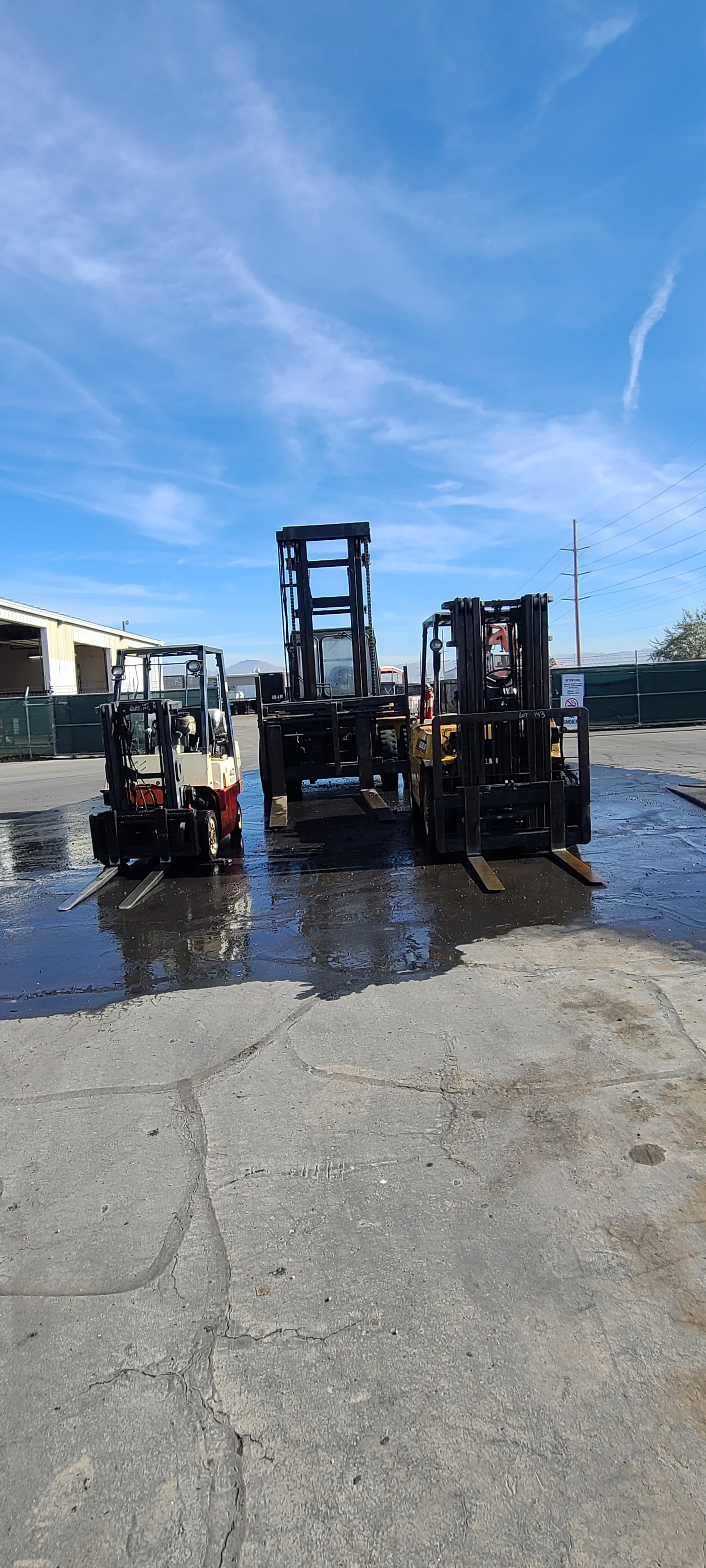 Mixed forklift fleet — Cat, Toyota, and Clark after industrial equipment washing, Salt Lake City Utah