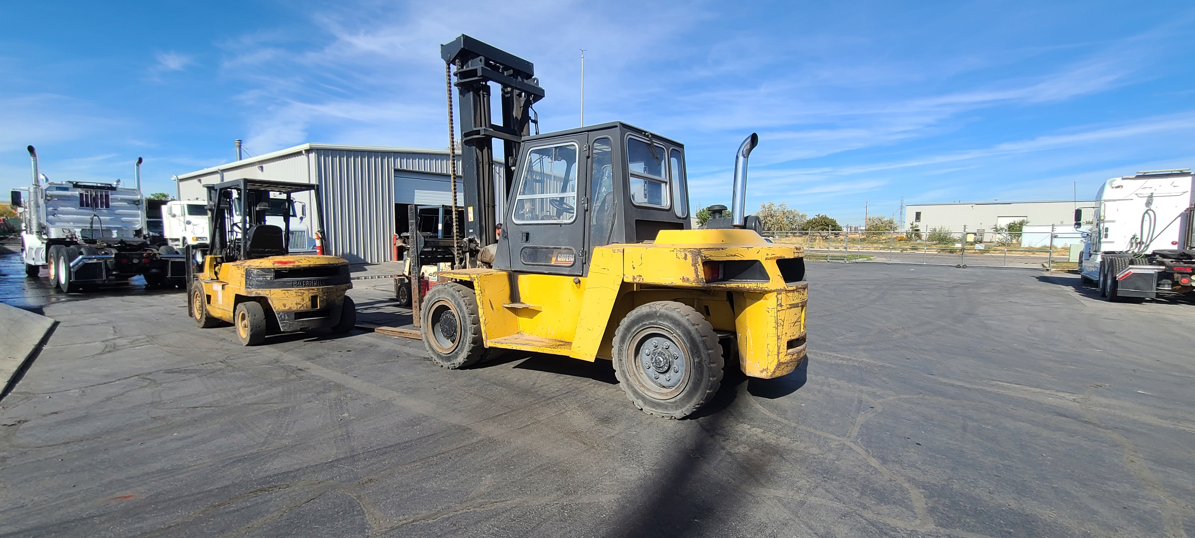 Caterpillar forklifts — hydraulic fluid and warehouse grime, Wilson Transport yard